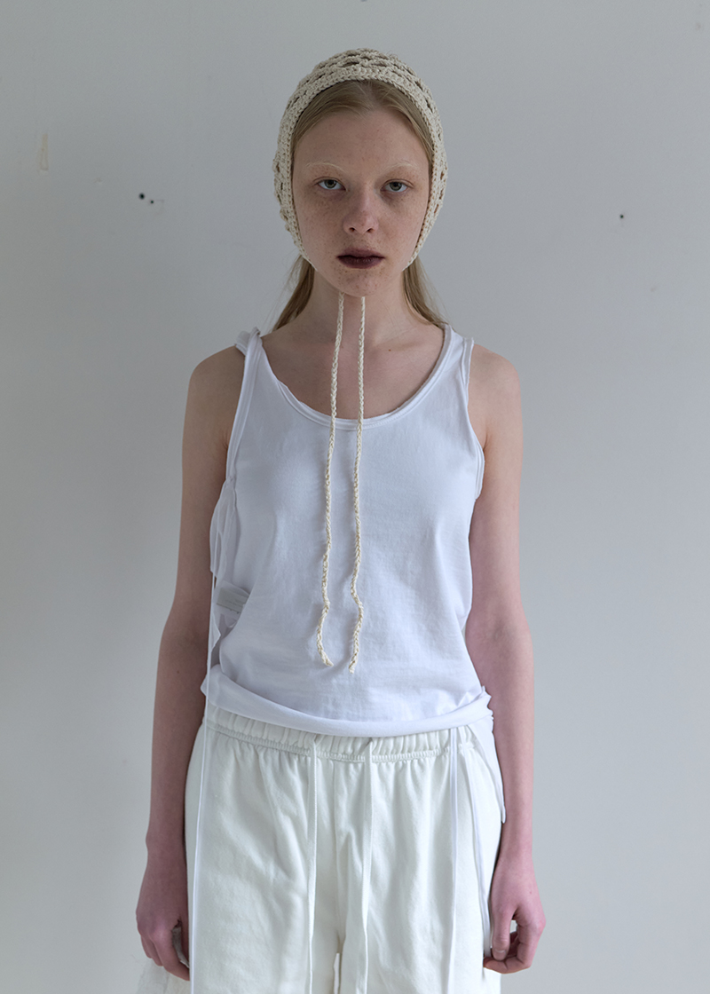 (REORDER) RAW DETAIL SLEEVELESS TOP IN WHITE